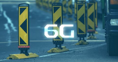 Futuristic 6g technology warning sign on busy road