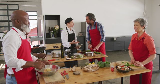 Group Enjoying Cooking Class Together in Modern Kitchen - Download Free Stock Images Pikwizard.com