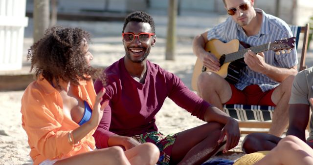 Friends Enjoying Beach Day with Guitar Music - Download Free Stock Images Pikwizard.com