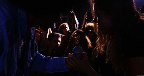 Energetic Night Out with Friends at Karaoke Bar - Download Free Stock Images Pikwizard.com