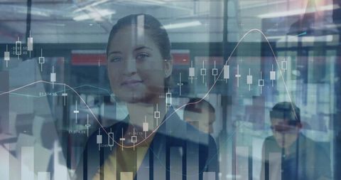Creative businesswoman analyzing financial data visuals in futuristic office