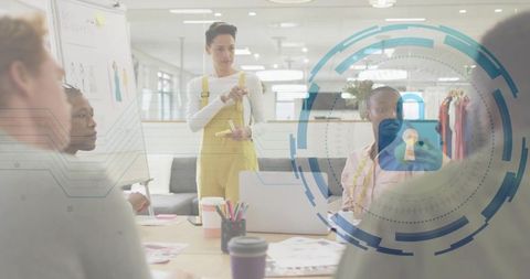 Fashion team collaborating on designs in modern studio