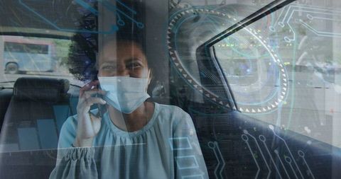 Businesswoman Wearing Mask Discussing Data Digitally Rendered