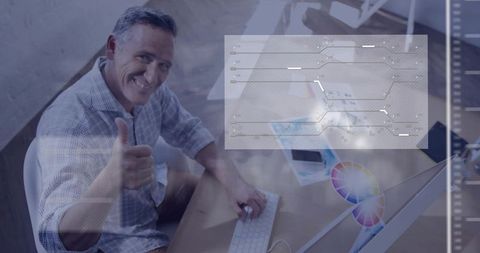 Creative Professional in Modern Loft Office Giving Thumbs-Up Gesture