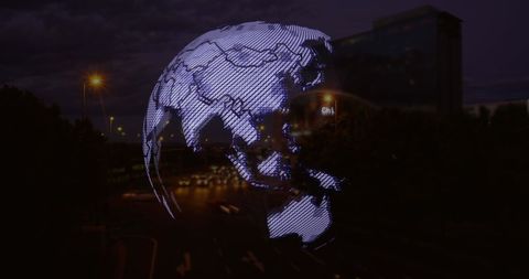 Digital Globe Overlaying City Traffic at Night