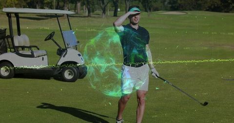 Golfer Analyzing Shot with Digital Technology Interface