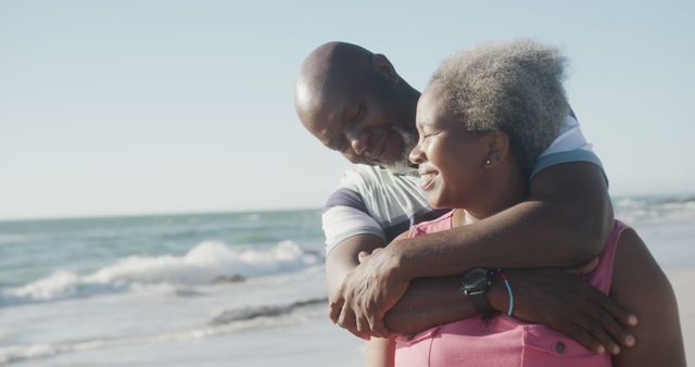 Happy Senior Couple Enjoying the Beach Together - Download Free Stock Images Pikwizard.com