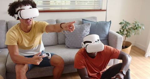 Diverse Friends Engaging in Virtual Reality Gaming Experience