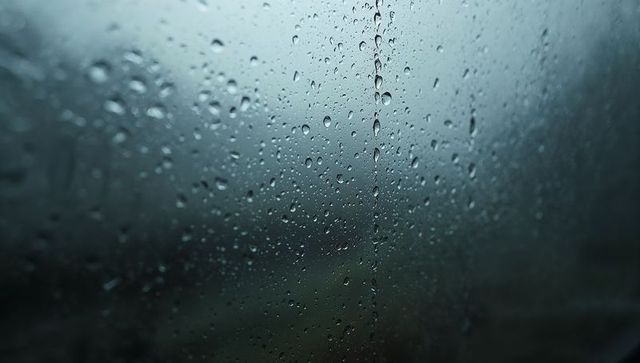Rain-Bathed Window Detail with Water Droplets