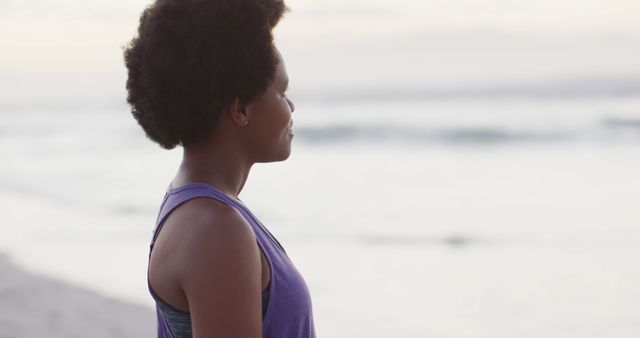 Serene Moment of Woman Gazing at Distant Ocean Horizon - Download Free Stock Images Pikwizard.com