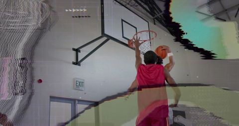 Dynamic Basketball Dunk with Digital Glitch Effect in Sports Venue