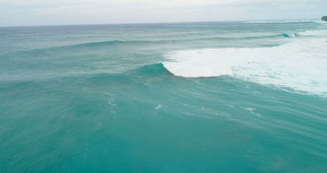 Aerial View of Turquoise Ocean Waves Crashing on Beach - Download Free Stock Images Pikwizard.com