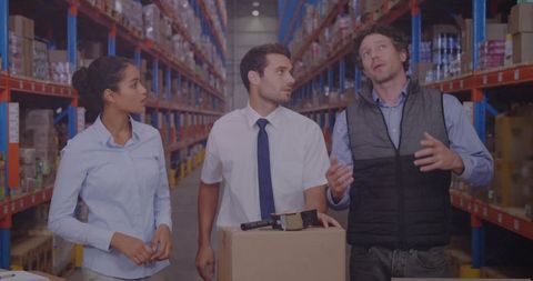 Warehouse team collaborating on efficient product labeling