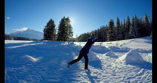 Woman Playing in Snow in Sunny Winter Landscape - Download Free Stock Images Pikwizard.com