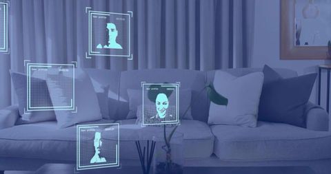 Modern living room projecting floating holographic user profiles over gray sofa