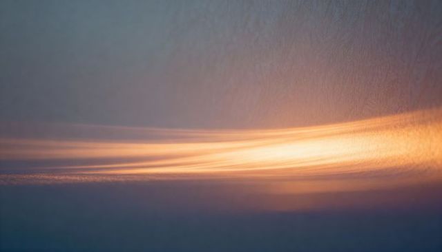 Glowing Amber Light Band Crossing Textured Wall, Minimalist Abstract Gradient and Ray