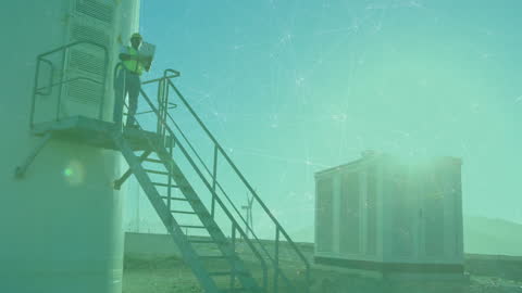 Engineer Overseeing Wind Energy Network with Digital Overlay