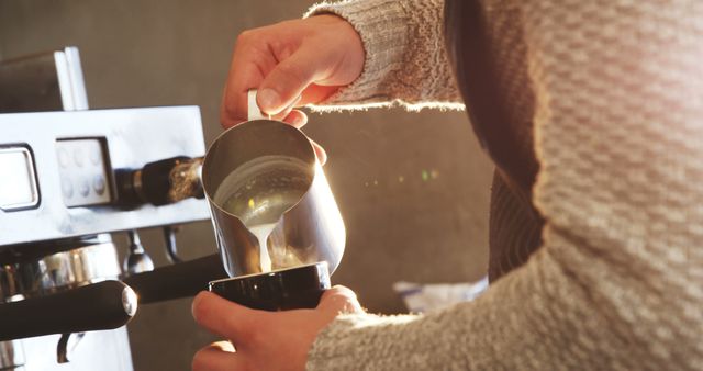 Barista Pouring Steamed Milk into Coffee Mug for Latte Art - Download Free Stock Images Pikwizard.com