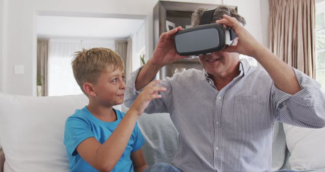 Elderly Man and Boy Exploring Virtual Reality Indoors - Download Free Stock Images Pikwizard.com
