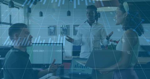 Corporate team analyzing data in modern office meeting