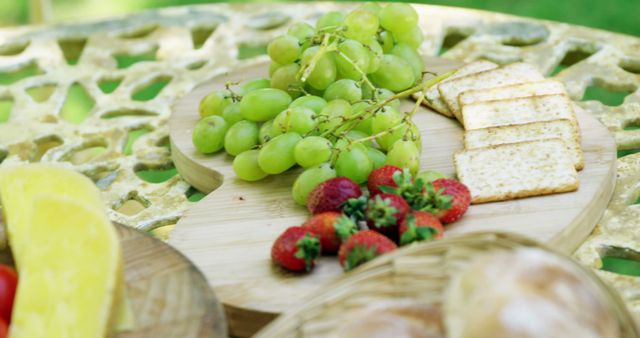 Fresh Fruit and Crackers on Garden Table - Download Free Stock Images Pikwizard.com