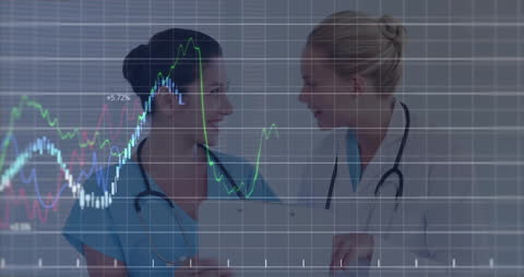 Medical Professionals Analyzing Data on Digital Tablet