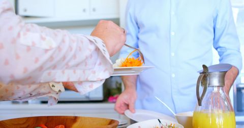 Caucasian Couple Sharing Wholesome Breakfast at Home