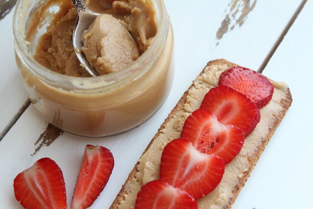 Healthy Breakfast with Rye Crispbread, Almond Butter, and Fresh Strawberries - Download Free Stock Photos Pikwizard.com