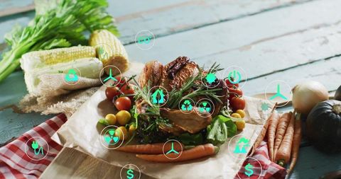 Roasted chicken resting on rustic plank with fresh vegetables and eco icons