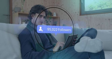 Influencer reclining on sofa holding tablet with 95,022 followers overlay in cozy minimalist room