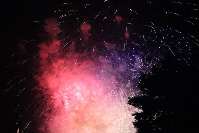 Colorful fireworks display illuminating night sky - Download Free Stock Photos Pikwizard.com