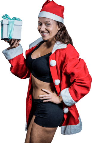 Festive Female Athlete in Santa Costume Holding Gift Transparent Background