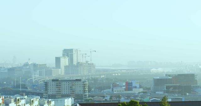General view of cityscape with multiple modern buildings with cloudless sky. urban skyline, city and architecture.