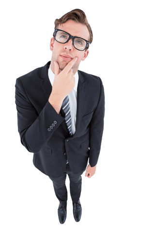 Thoughtful businessman in suit looking up, transparent background