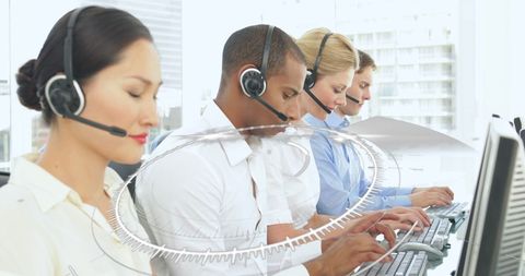 Multiracial Call Center Team Using Computers with Digital Overlay - Download Free Stock Images Pikwizard.com