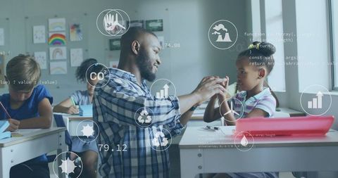 Male teacher guiding girl with interactive data overlays, mentoring STEM learning in classroom