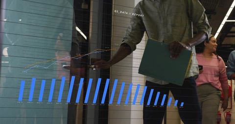 Team entering modern office with data analytics overlay and collaborative business planning
