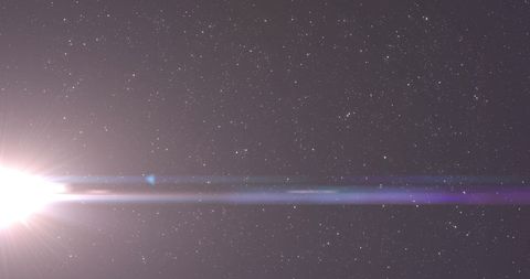 Starlit Sky with Brilliant Light Flare Displaying Cosmic Energy - Download Free Stock Images Pikwizard.com