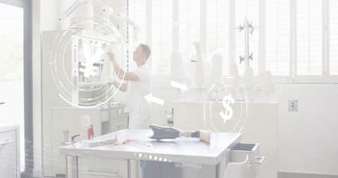 Technician adjusting prosthetic leg in clinical lab calibrating advanced prosthetic socket