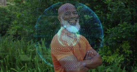 Smiling man with holographic globe in garden setting