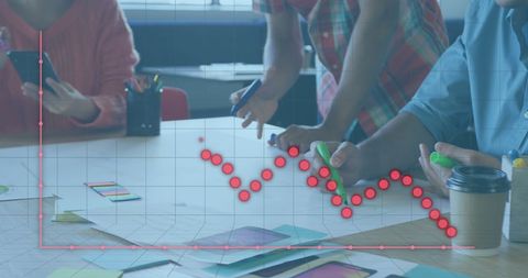 Team collaborating over financial data with graph overlay