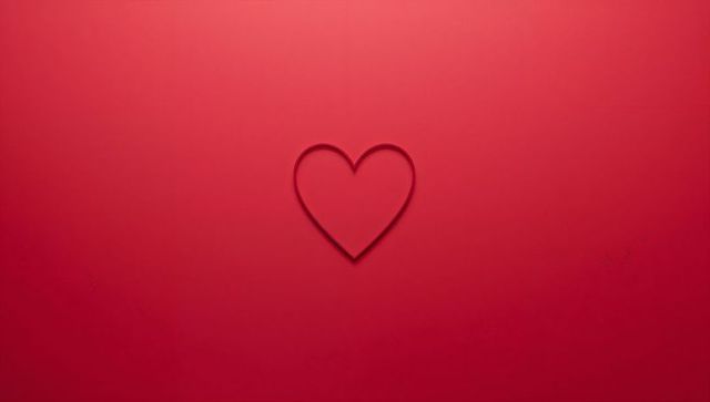 Floating thin heart outline on red backdrop minimalist valentine love symbol for design