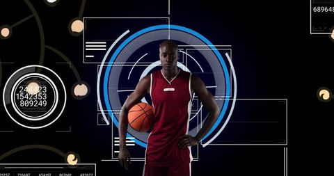 Athletic male analyzing data with futuristic hud interfaces