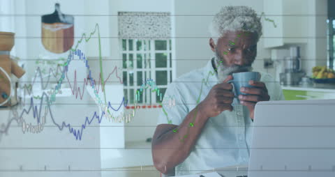 Senior Man Analyzing Financial Data on Laptop