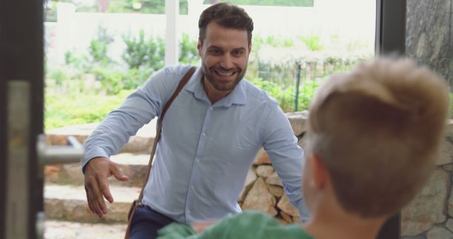 Happy Man Returning Home Greeting Child - Download Free Stock Images Pikwizard.com