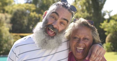 Joy and Friendship, Elderly Friends Enjoying Outdoor Laughter