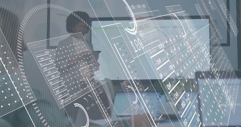 Man in collared shirt wearing eyeglasses analyzing data on laptop with hud overlays