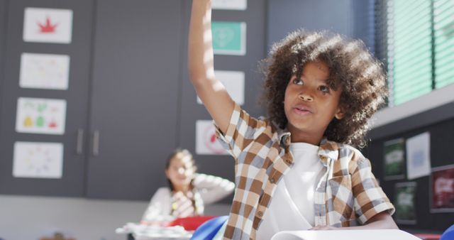 Curious Child Raising Hand in Classroom - Download Free Stock Images Pikwizard.com