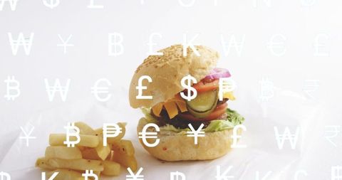 Burger and fries with currency symbols overlay representing food cost and pricing