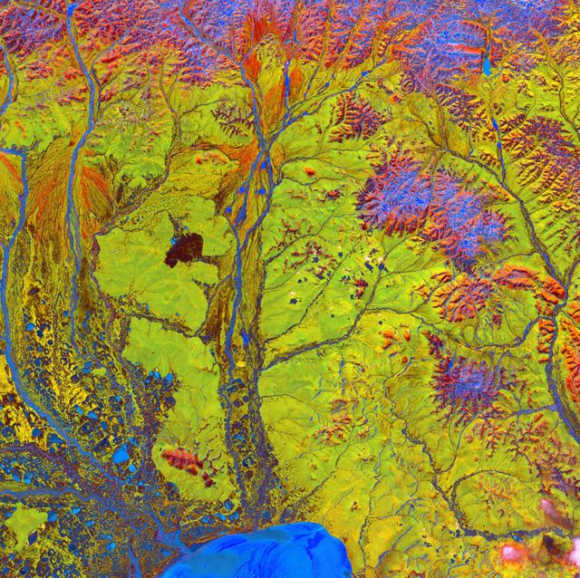Siberian Ribbons - June 15th, 2005  Description: Vivid colors and bizarre shapes come together in an image that could be an imaginative illustration for a fantasy story. This labyrinth of exotic features is present along the edge of Russia's Chaunskaya Bay (vivid blue half circle) in northeastern Siberia. Two major rivers, the Chaun and Palyavaam, flow into the bay, which in turn opens into the Arctic Ocean. Ribbon lakes and bogs are present throughout the area, created by depressions left by receding glaciers.  Credit: USGS/NASA/Landsat 5  To learn more about the Landsat satellite go to: <a href="http://landsat.gsfc.nasa.gov/" rel="nofollow">landsat.gsfc.nasa.gov/</a>  <b><a href="http://www.nasa.gov/centers/goddard/home/index.html" rel="nofollow">NASA Goddard Space Flight Center</a></b> enables NASA’s mission through four scientific endeavors: Earth Science, Heliophysics, Solar System Exploration, and Astrophysics. Goddard plays a leading role in NASA’s accomplishments by contributing compelling scientific knowledge to advance the Agency’s mission.  <b>Follow us on <a href="http://twitter.com/NASA_GoddardPix" rel="nofollow">Twitter</a></b>  <b>Join us on <a href="http://www.facebook.com/pages/Greenbelt-MD/NASA-Goddard/395013845897?ref=tsd" rel="nofollow">Facebook</a></b>